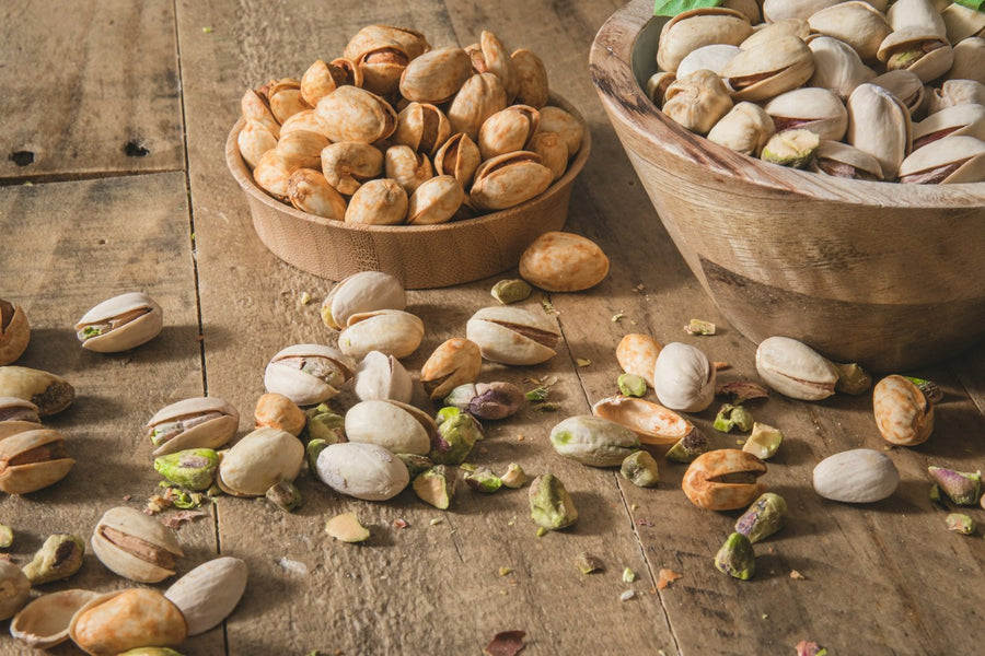 Pistachios in wooden bowls